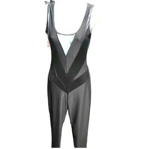 Leather and sheer jumpsuit by Sabora.